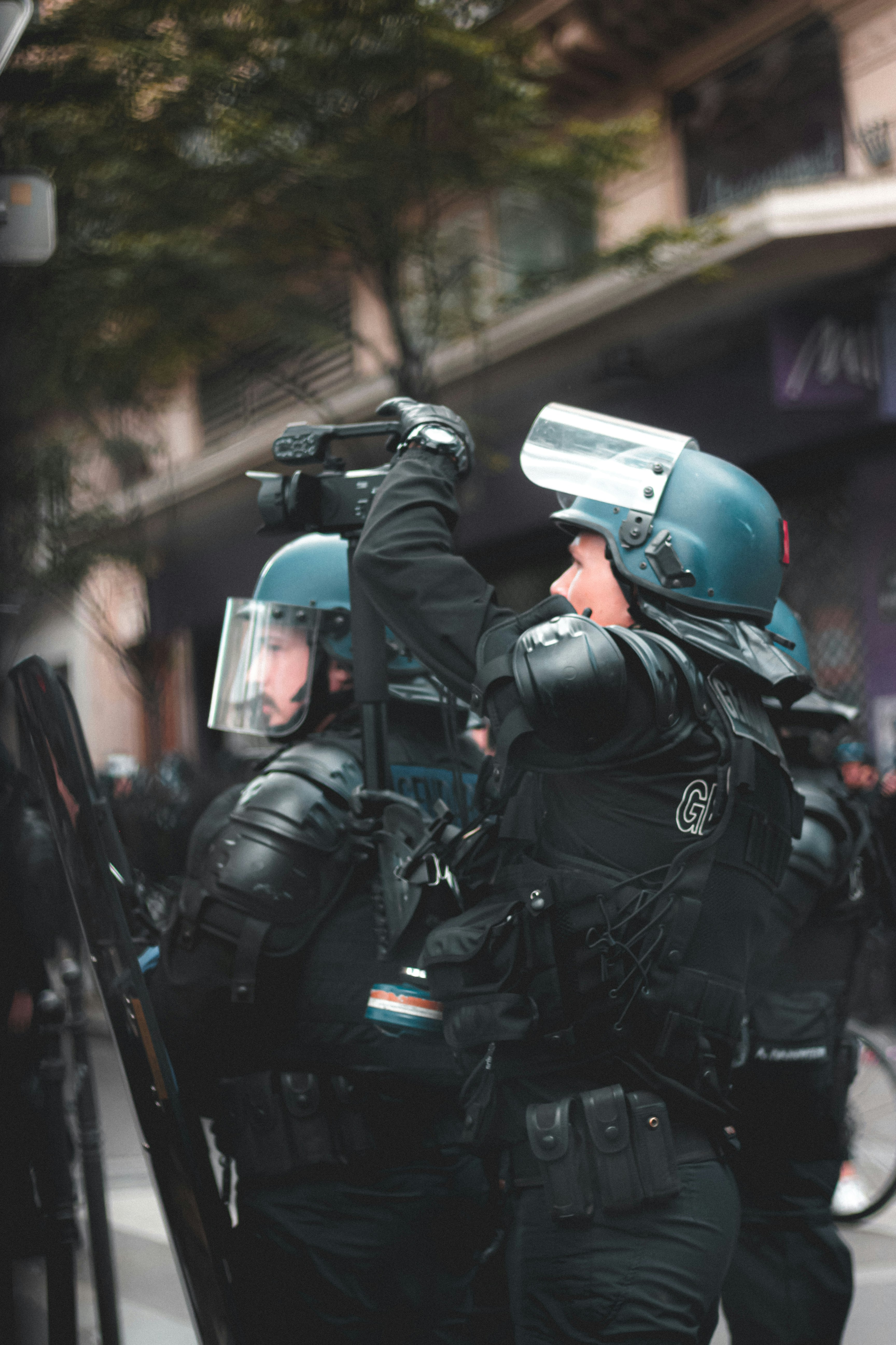 man in black helmet and black helmet